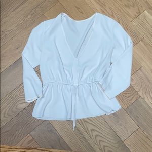 Aritzia blouse w/ a cinched waist